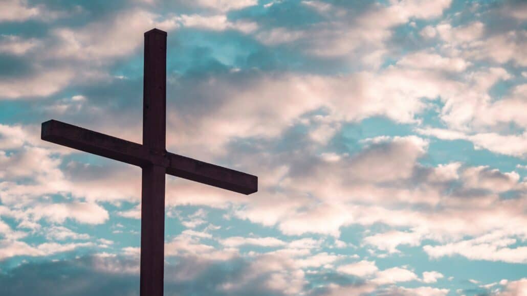 cross in the sky | Photo by Aaron Burden on Unsplash