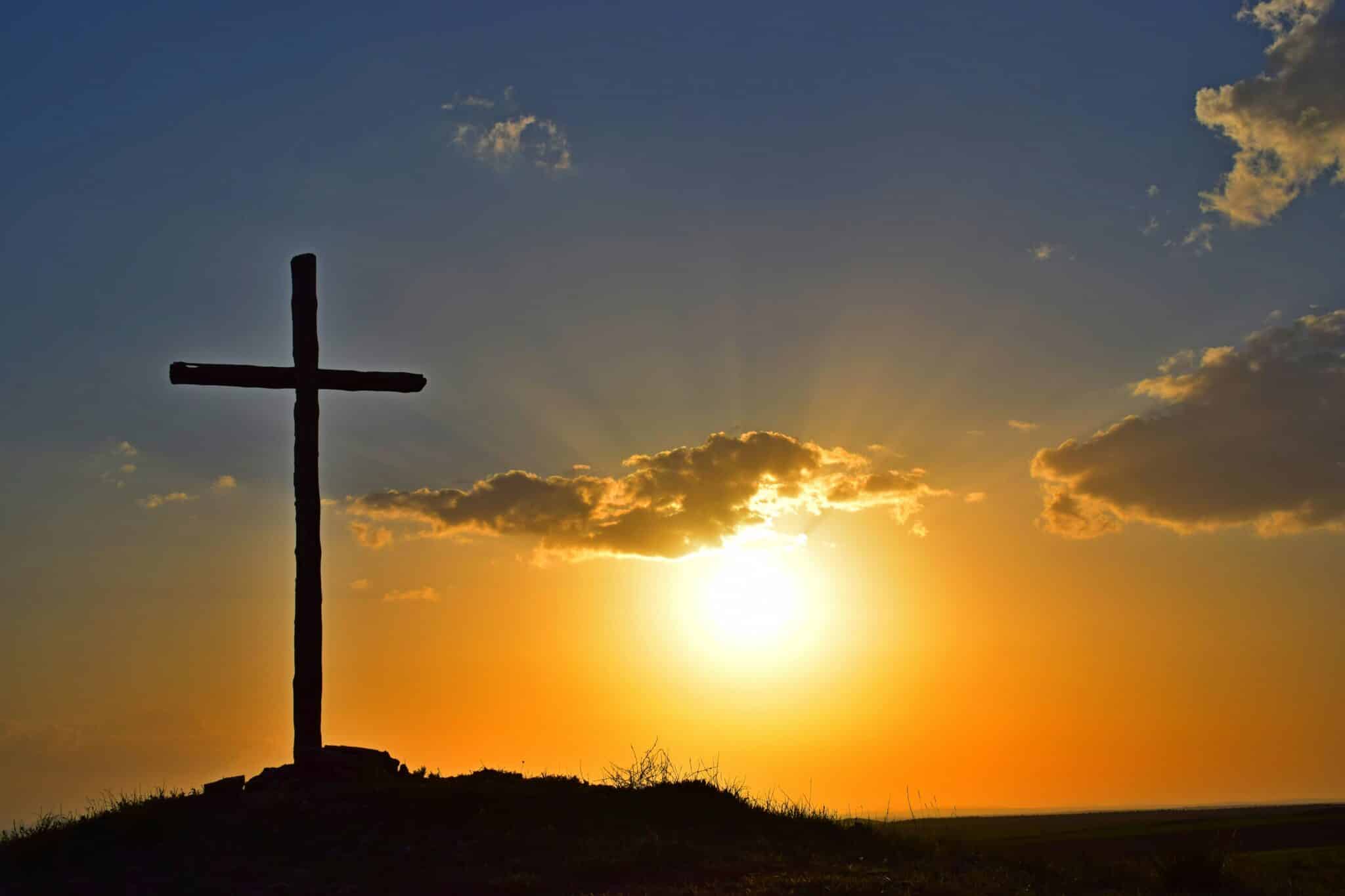 Cross and sunrise | Photo by Cdoncel on Unsplash