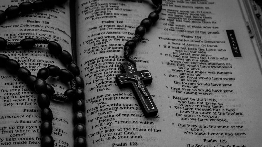Rosary on a bible | Photo by Anuja Tilj on Unsplash
