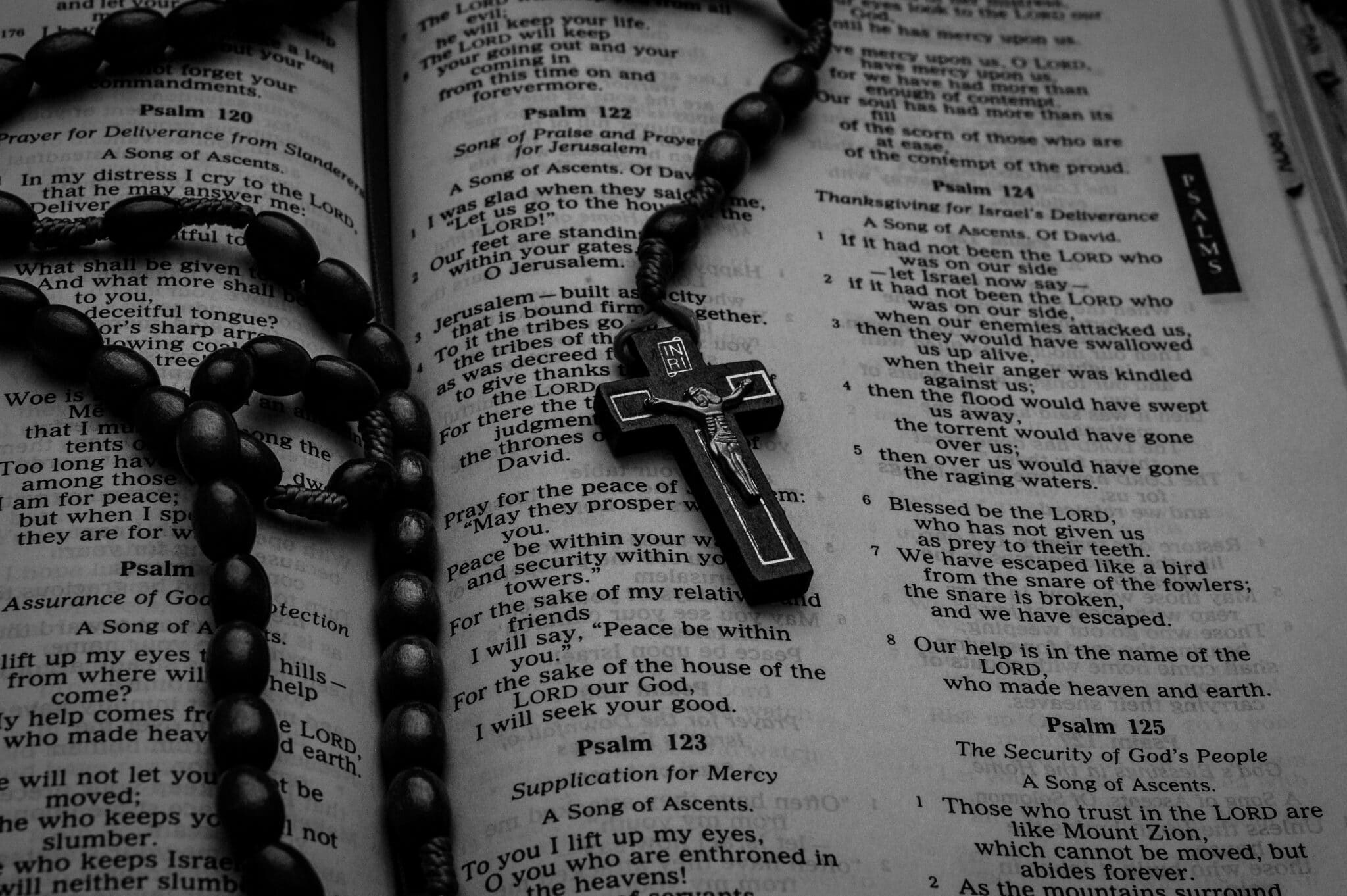 Rosary on a bible | Photo by Anuja Tilj on Unsplash