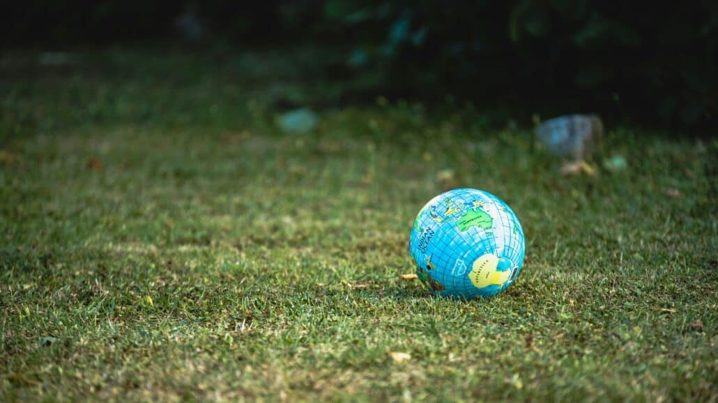 Globes on the ground | Photo by Guillaume de Germain on Unsplash