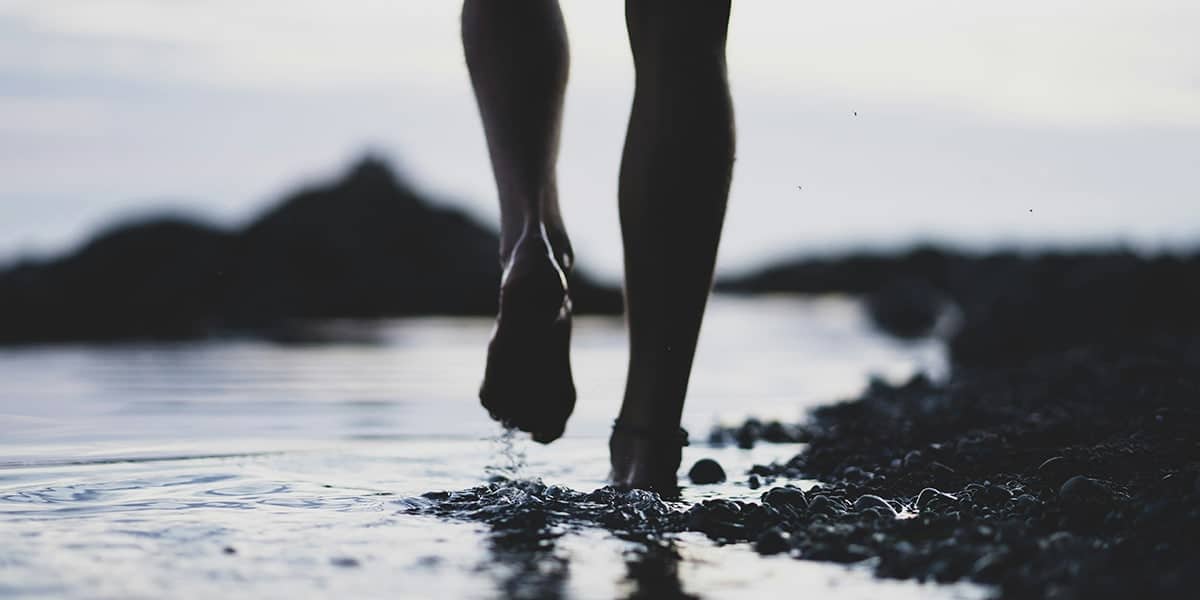 Woman walking in water