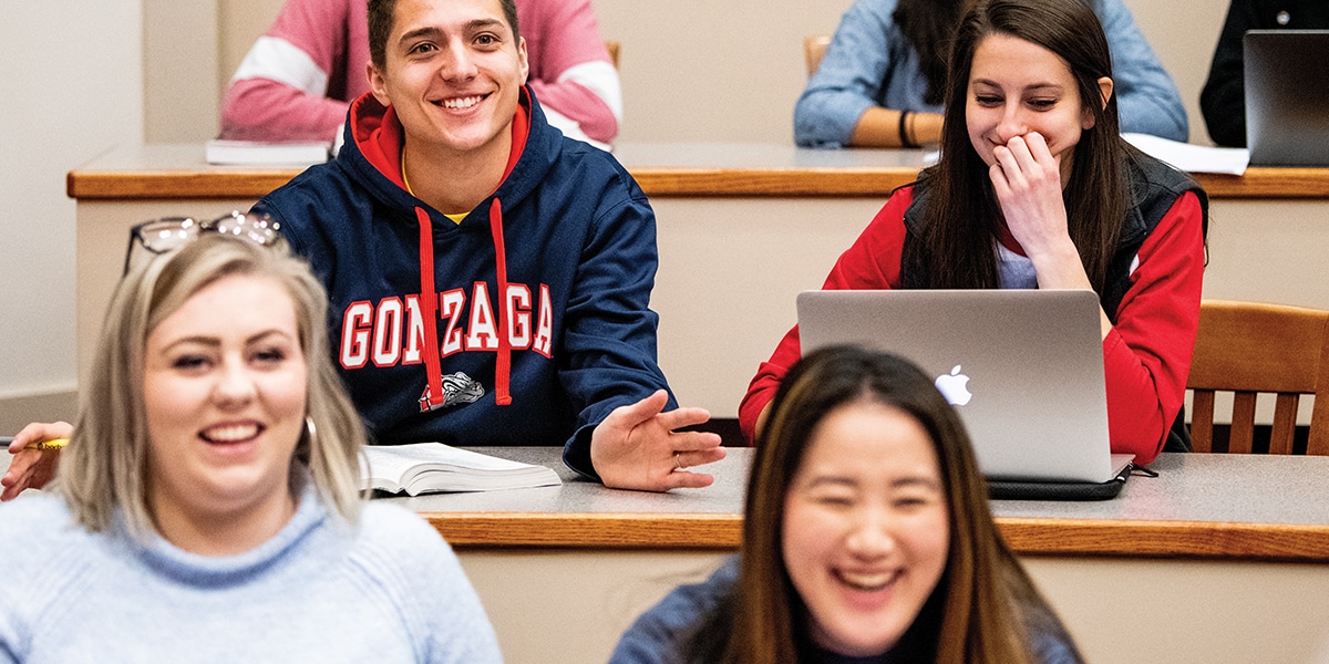 Students sit in a college classroom