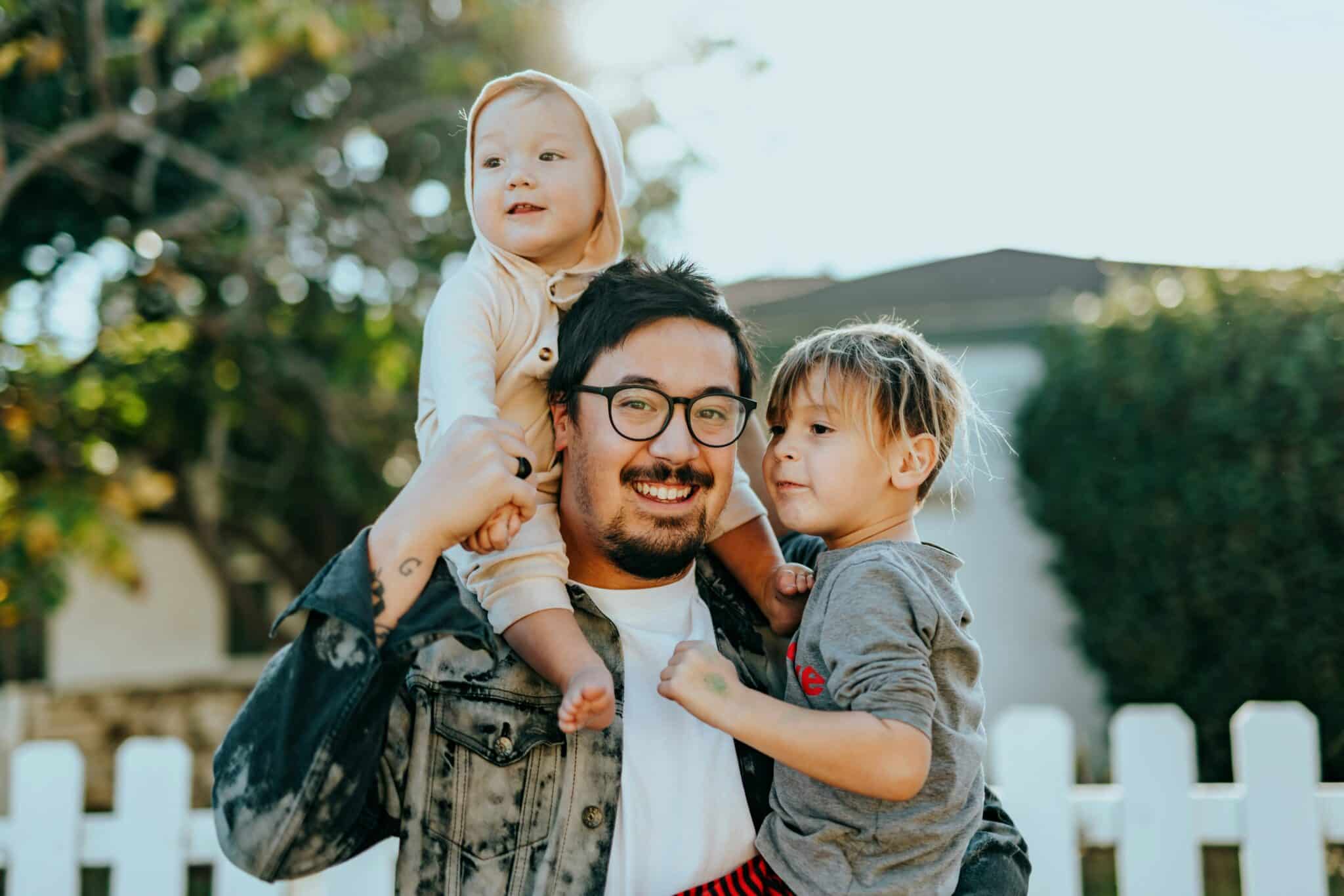father and kids | xPhoto by Nathan Dumlao on Unsplash