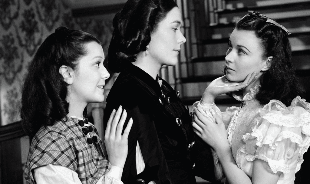 Actor Barbara O’Neil, pictured in the center, played Ellen, mother to Scarlett (right) and Carreen (left). As opposed to her eldest daughter, Ellen was “driven by conscience,” Mitchell wrote.