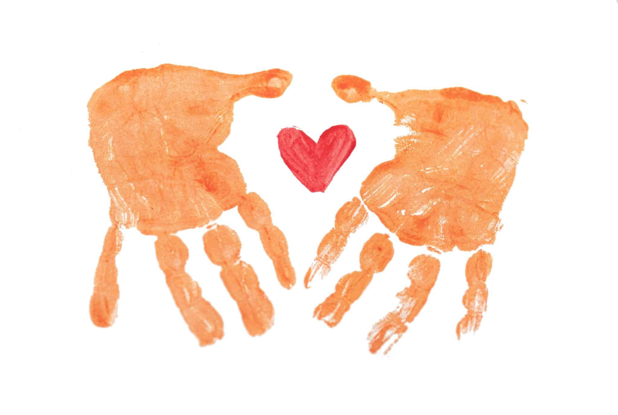 hand print with a heart | Photo by Rod Long on Unsplash