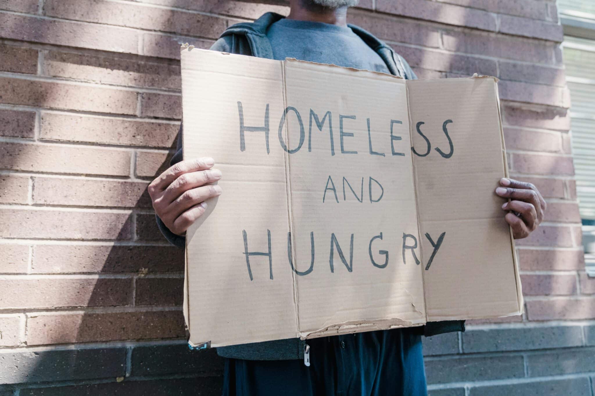 Homeless sign | Photo by Timur Weber