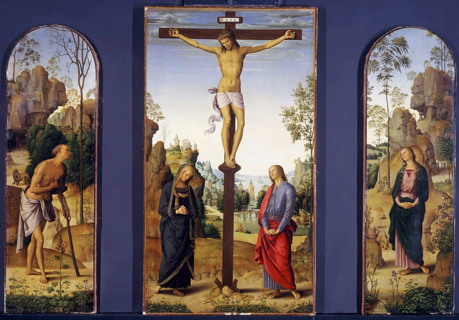 The plants and flowers in Pietro Perugino's "The Crucifixion with the Virgin, St. John, St. Jerome and St. Mary Magdalene" convey a symbolic message. Perugino used red poppies, violets and a deep-pink mallow to symbolize death, humility and salvation, respectively. The painting is among those on display in "The Flowering of Florence: Botanical Art for the Medici" exhibit at the National Gallery of Art in Washington through May 27. (CNS photo courtesy National Gallery of Art)