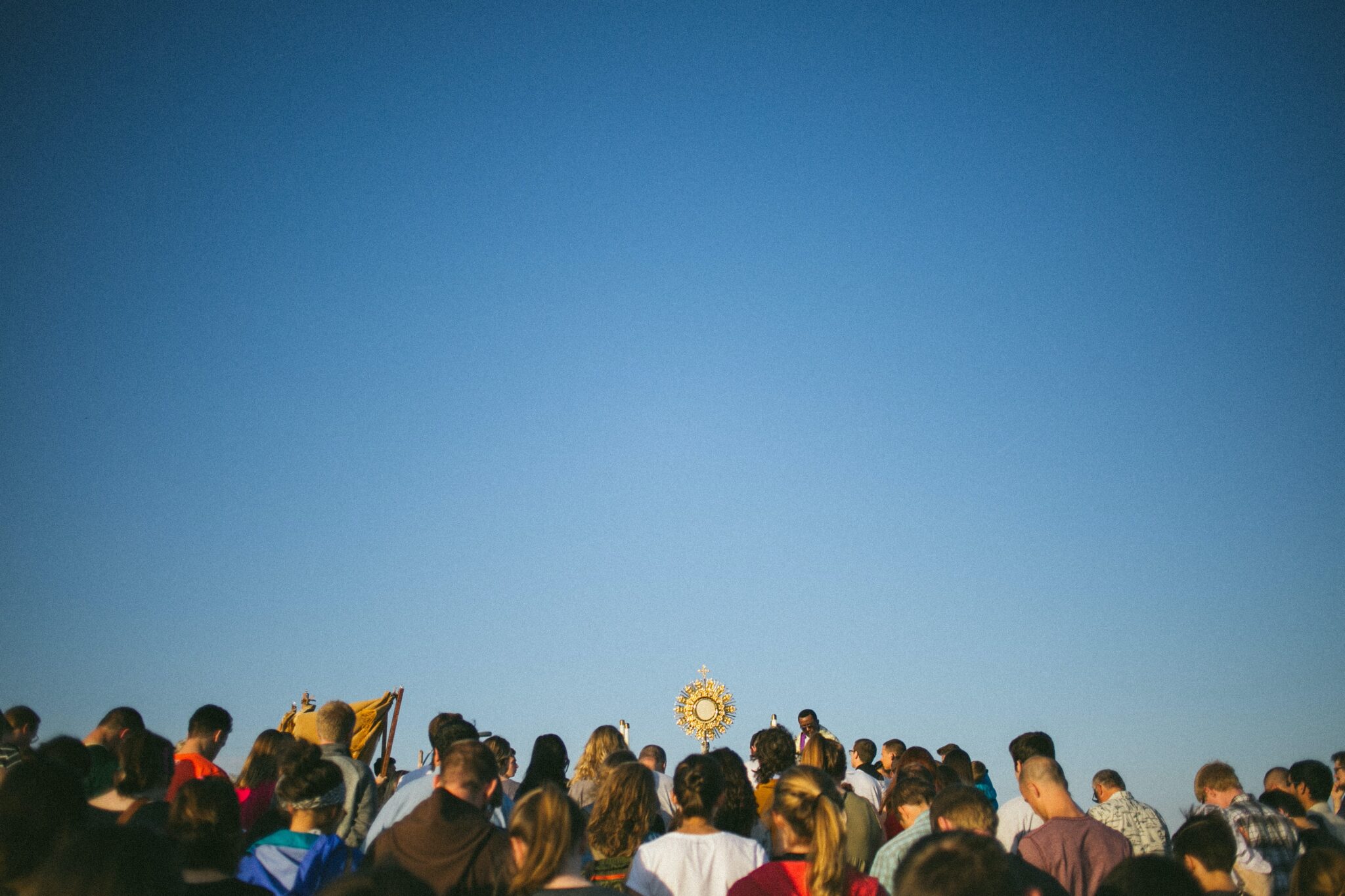 people attend mass outside