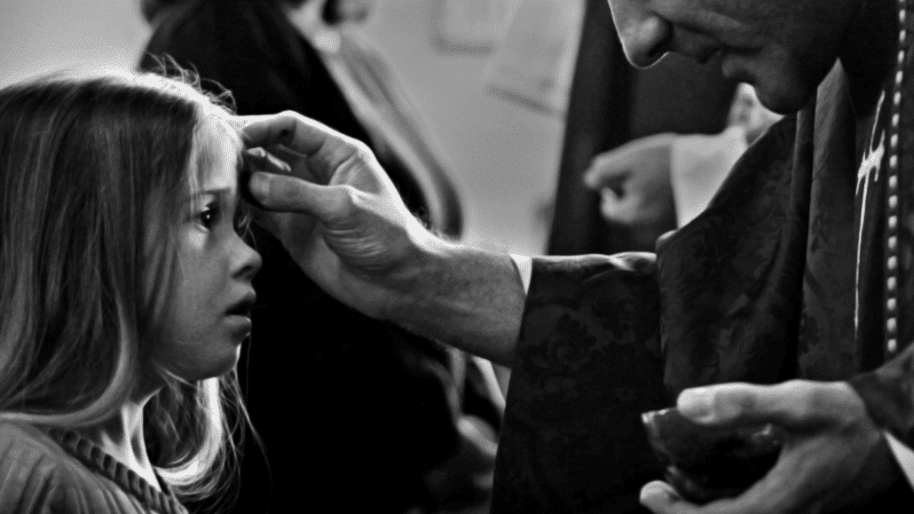 Child receives ashes on Ash Wednesday