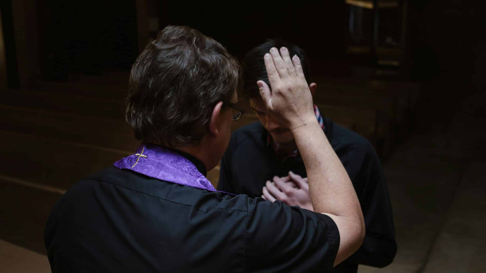 Priest offers a blessing | Photo by Josh Applegate on Unsplash
