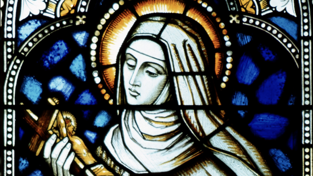 St. Rita of Cascia is portrayed in a stained glass window at St. Francis Convent in Springfield, Ill. Archbishop Domenico Battaglia of Naples, Italy, has ordered the removal of paintings in a Naples church depicting Our Lady of Pompeii and St. Rita; they were donated by the late mafia boss Lorenzo Nuvoletta. (CNS photo)