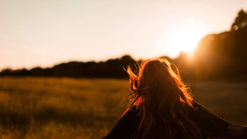 woman twirling | Photo by Sasha Freemind on Unsplash