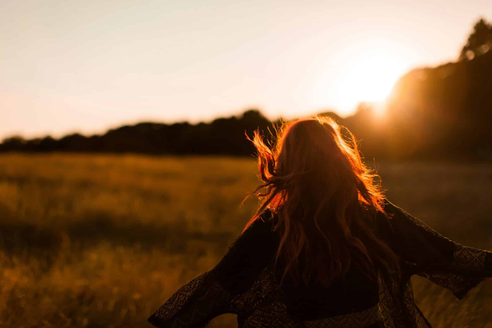 woman twirling | Photo by Sasha Freemind on Unsplash