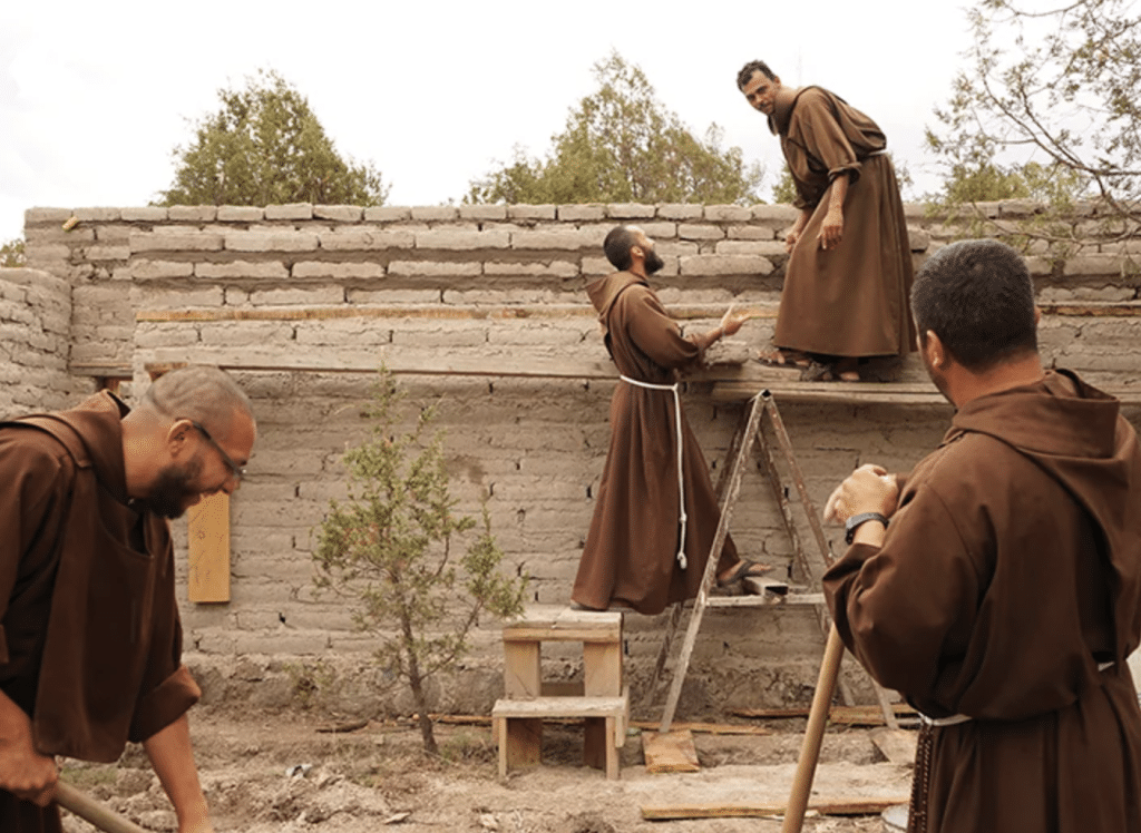 In the photo titled Francis, Repair My Church, one can imagine the early followers of St. Francis in a similar setting, assisting their leader in rebuilding churches and chapels.