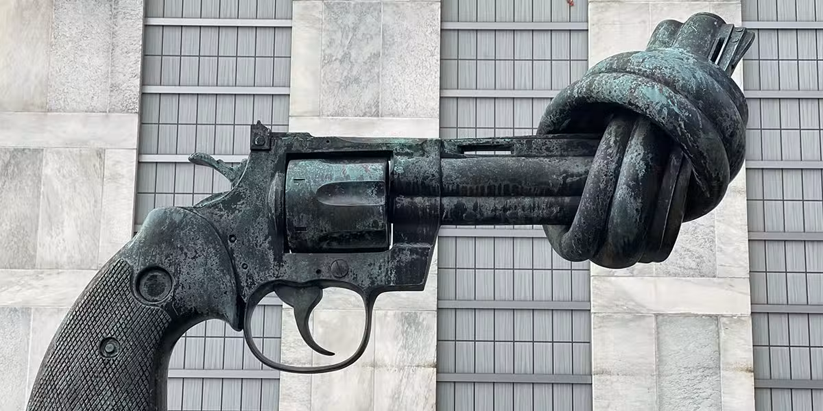 Gun control statue
