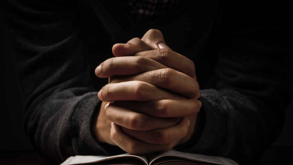 hands together in prayer