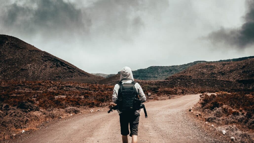 man walks in the desert