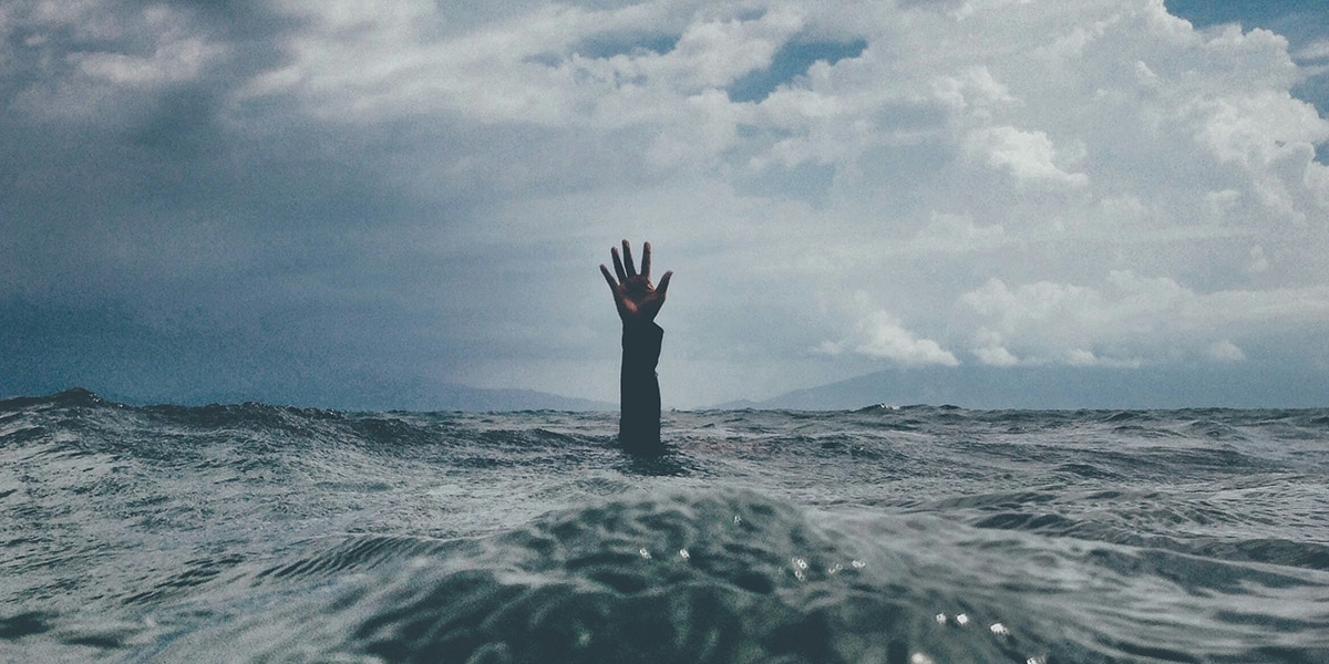 in a crisis reach for god Nikko macaspac/unsplash