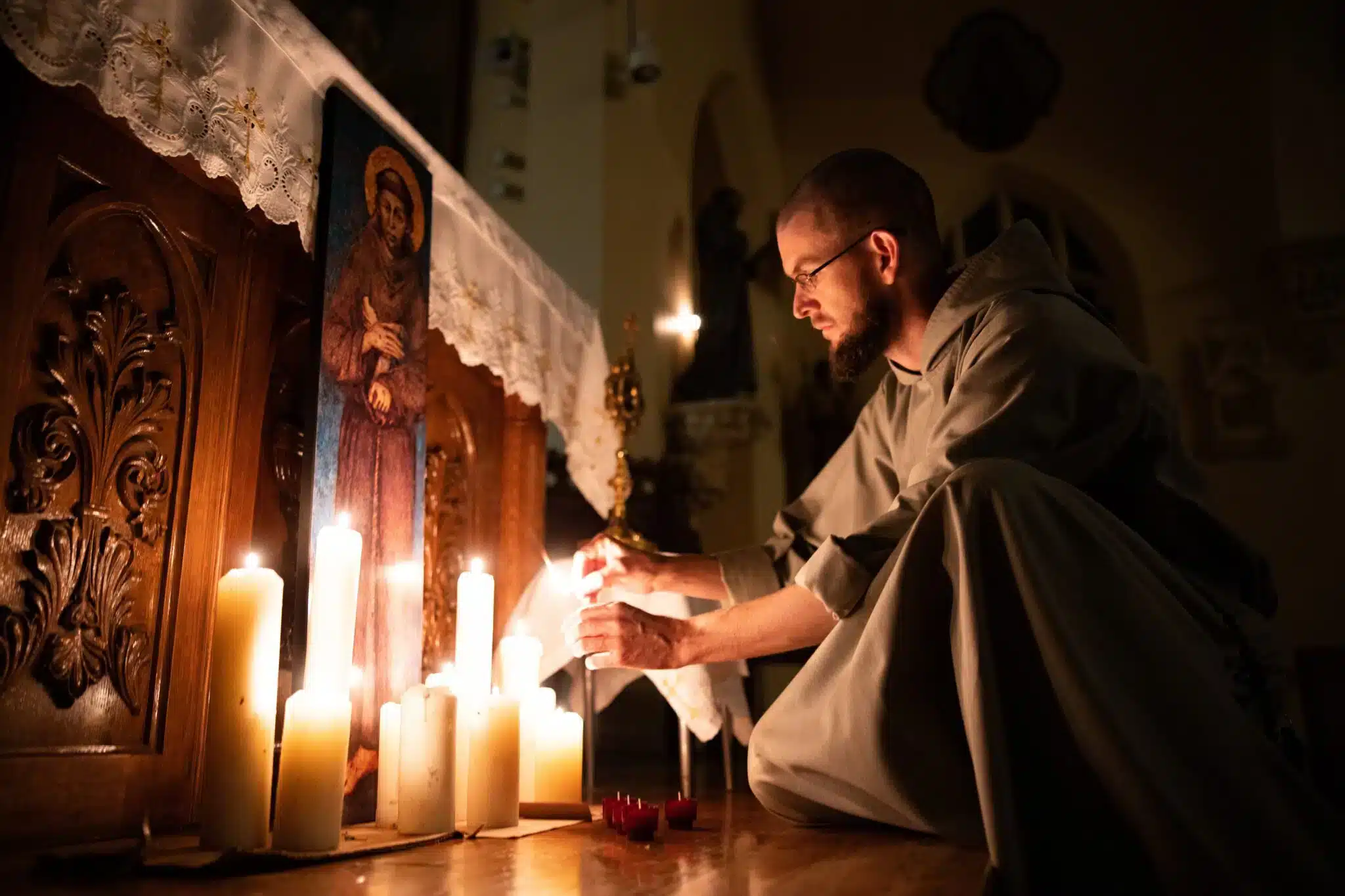 Franciscan Father Gabriel Emmanuel prepares the sanctuary for the "transitus"