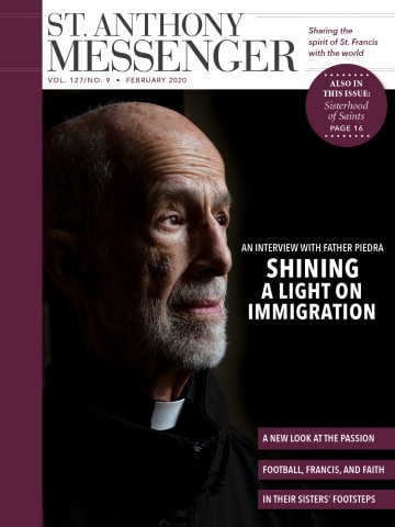 February cover shining a light on immigration