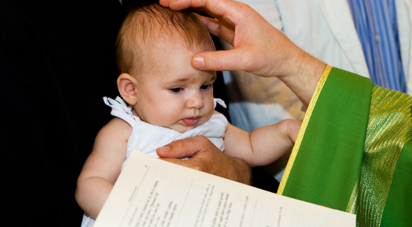 A baby being blessed