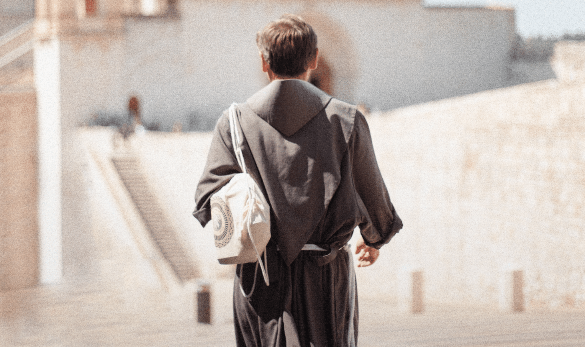 Franciscan- Friar walking near the Basilica of Saint Francis of Assisi