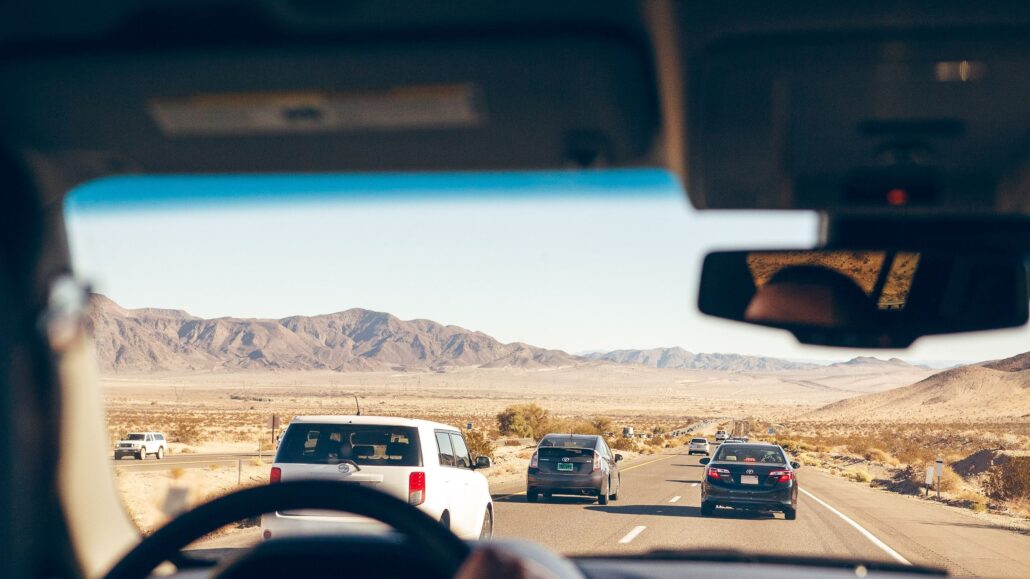 Cars driving on the highway in the desert