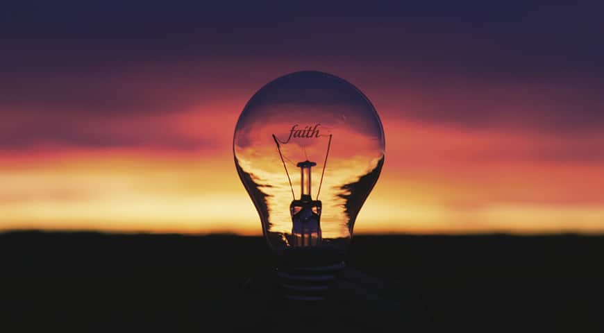 Faith written on a light bulb