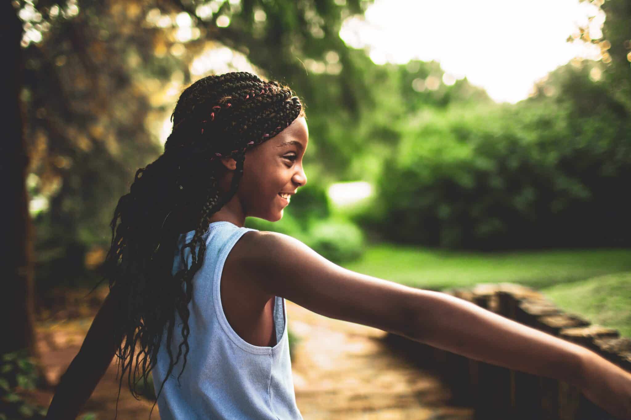 Young girl smiling happily