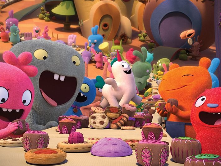 Childlike animated figures smiling