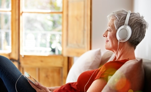 Woman listening to headphones