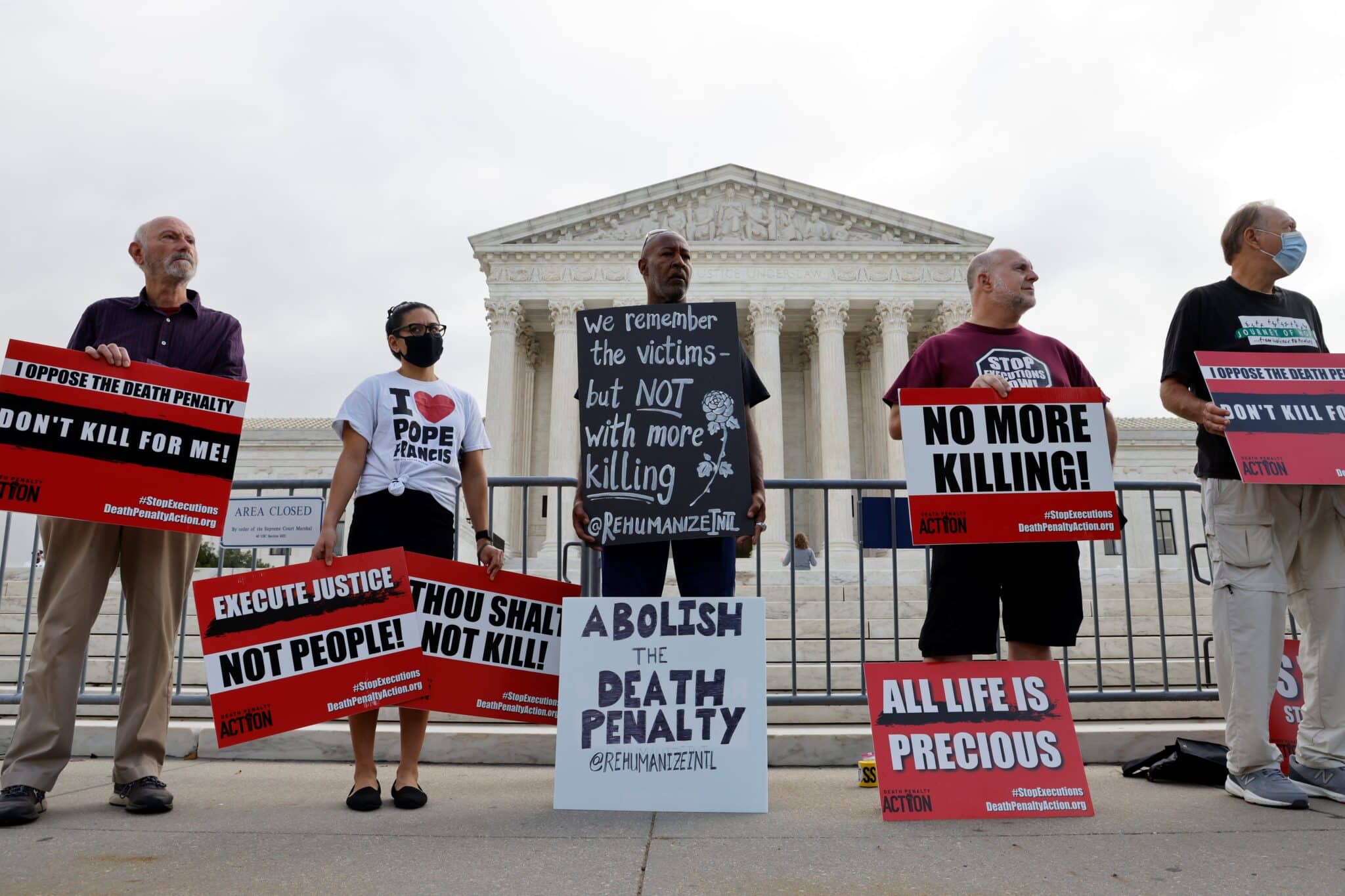 A group of demonstrators rally against the death penalty outside the U.S. Supreme Court building in Washington Oct. 13, 2021. (CNS photo/Jonathan Ernst, Reuters)