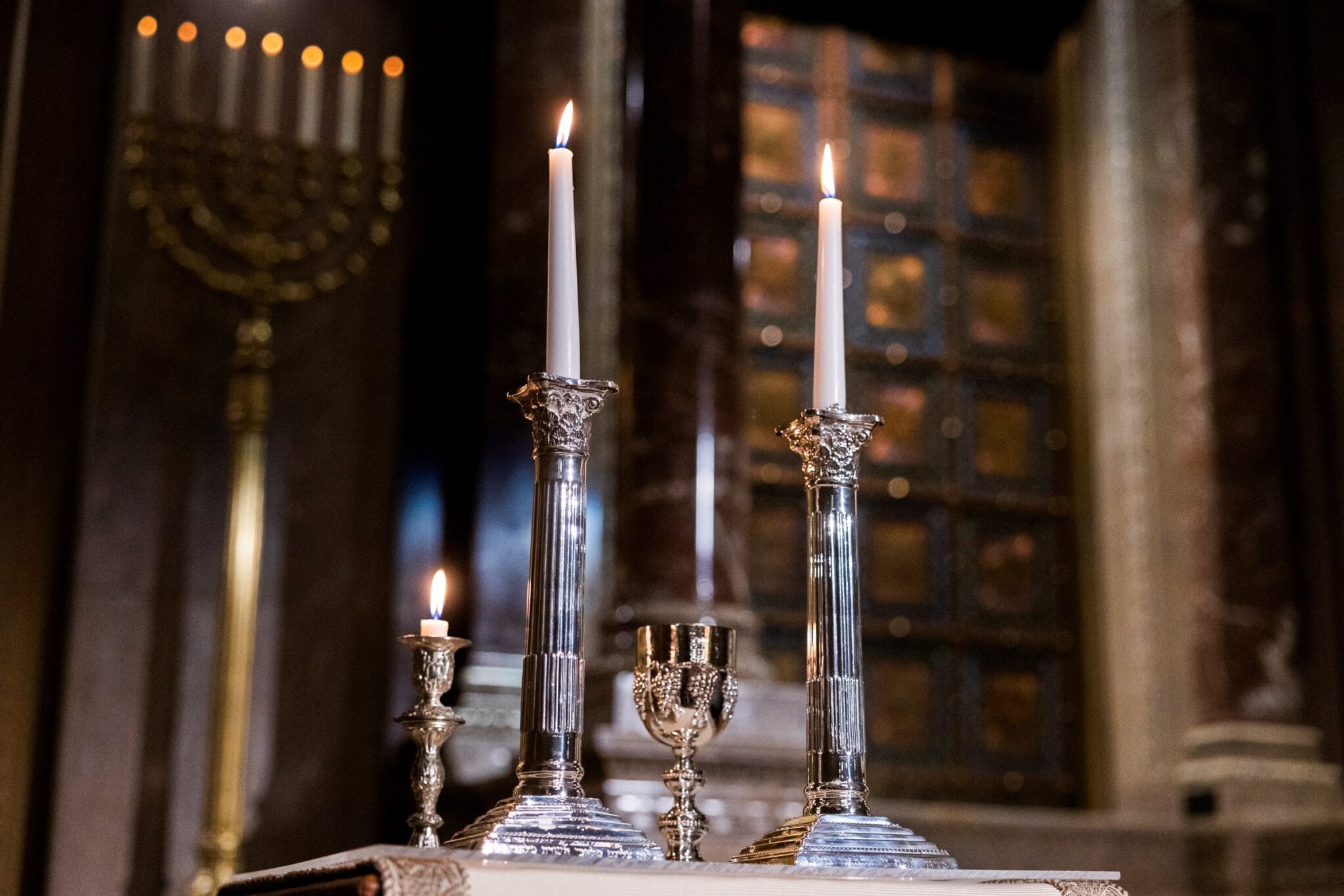 Festival candles at Rodeph Shalom in Philadelphia are seen during a service marking Erev Rosh Hashanah Sept. 6, 2021. (CNS photo/Rachel Wisniewski, Reuters)