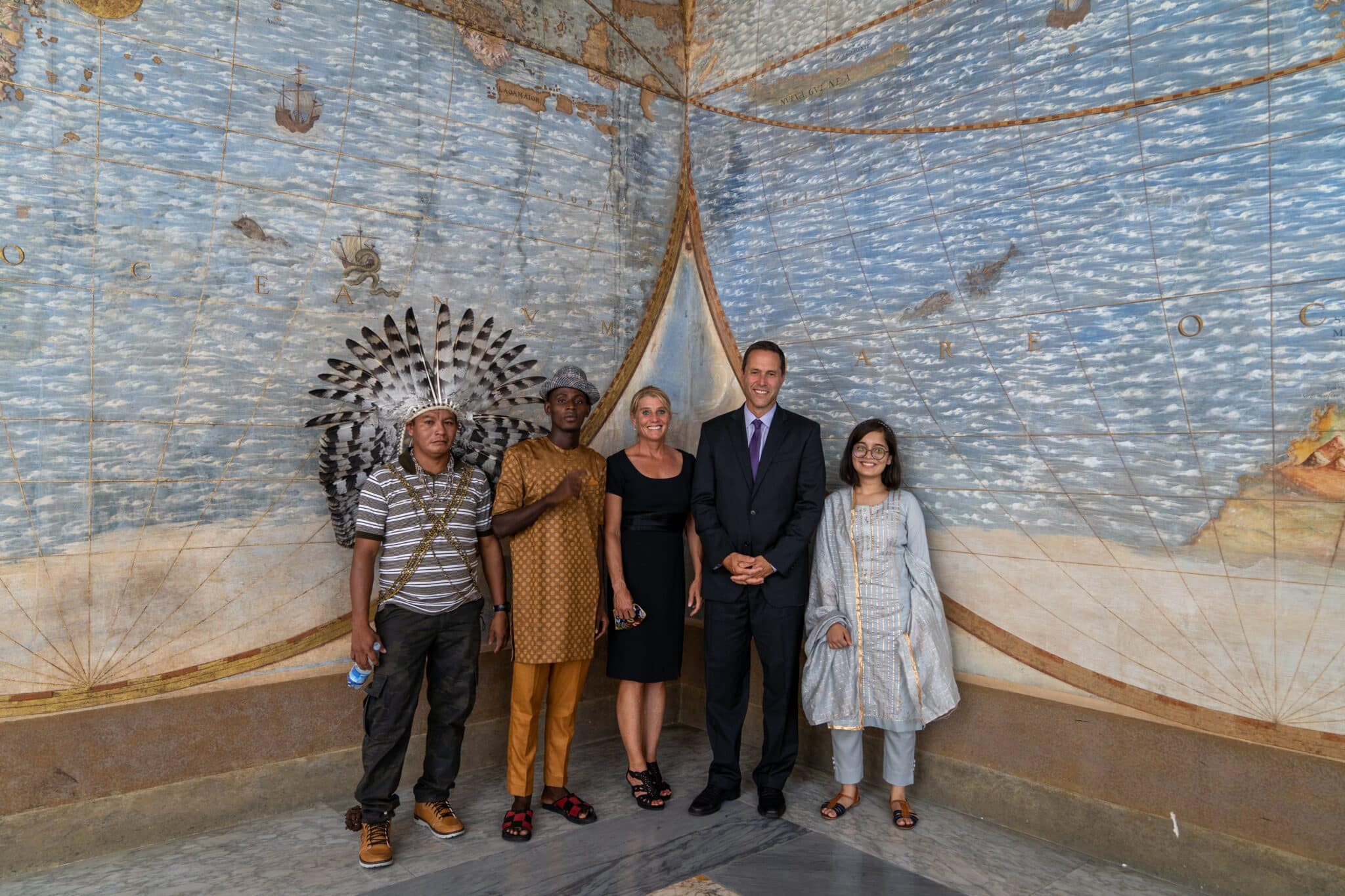 Chief Dadá Borarí from the Maró Indigenous Lands of the Brazilian Amazon; Arouna Kandé, a climate change refugee from Senegal; U.S. scientists Robin Martin and Greg Asner; and teenage climate activist Ridhima Pandey of India participated in the making of the documentary "The Letter." They are seen inside the Apostolic Palace at the Vatican Aug. 26, 2021. The film tells the story of a journey to Rome of frontline leaders to discuss with Pope Francis his encyclical "Laudato Si', on Care for Our Common Home." (CNS photo/courtesy Off the Fence)