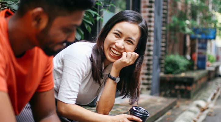 Two people talking, smiling, being available to each other