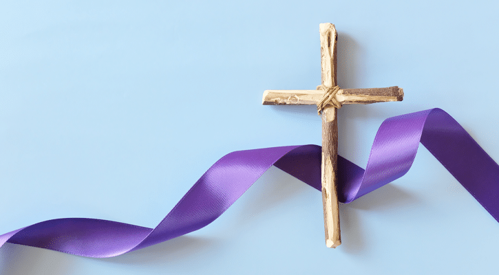 Cross with a purple ribbon
