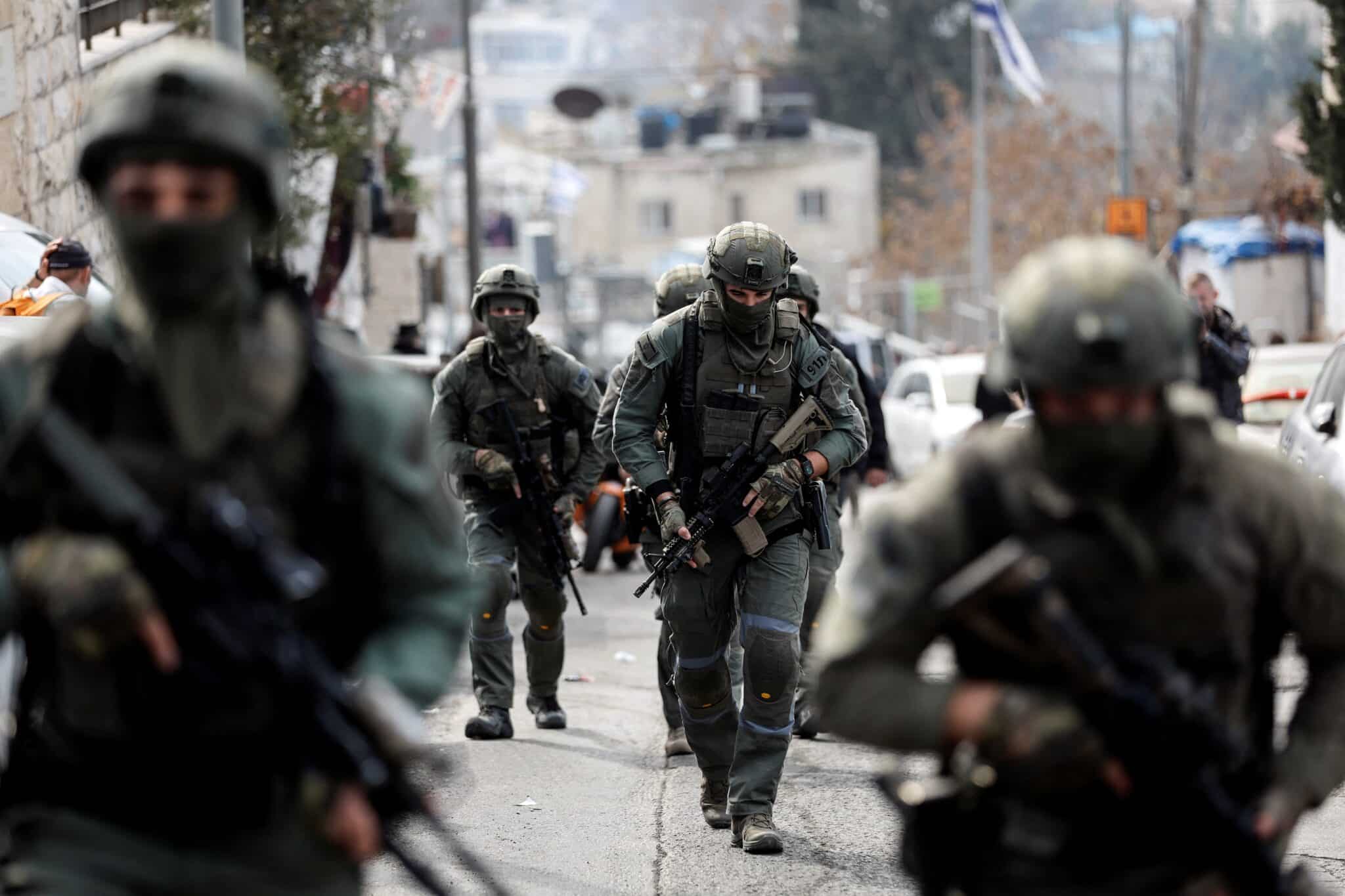 Israeli security personnel work at a scene where a suspected incident of shooting attack took place, police spokesman said, just outside Jerusalem's Old City Jan. 28, 2023. Jerusalem spiraled into a weekend of violence as seven Israelis were killed Jan. 27 at a synagogue after prayers and another shooting the next day left two Israelis injured just outside of the Old City in the Palestinian village of Silwan where Jewish settlers have established themselves and an archaeological site. (OSV News photo/Ammar Awad, Reuters)