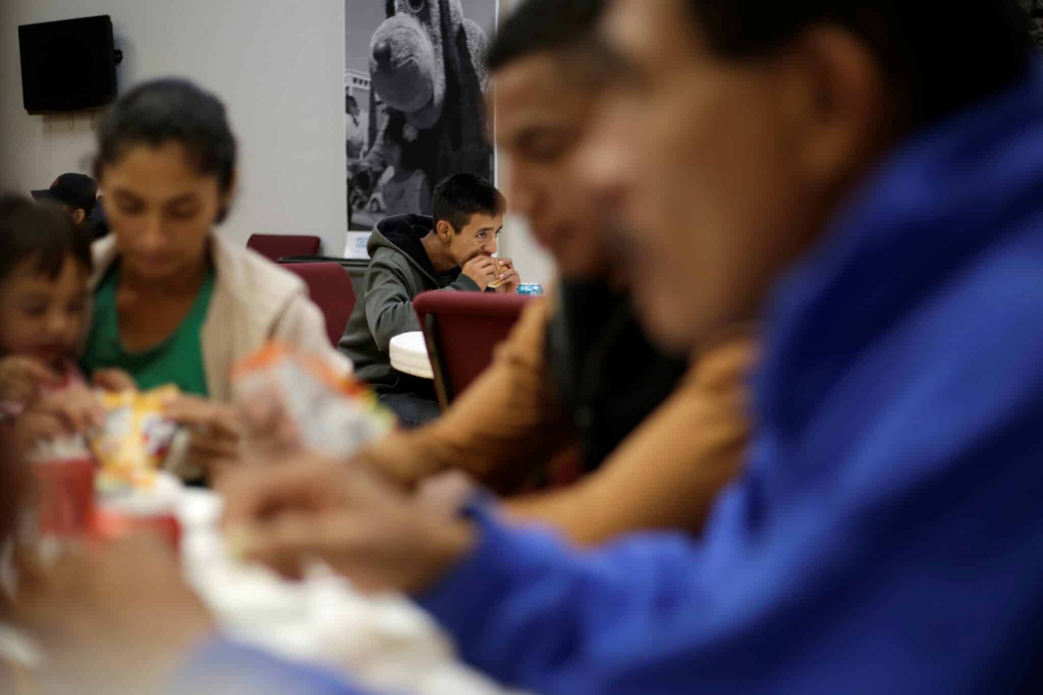 Migrants from Central America eat at Vino Nuevo church, which gives temporary shelter to migrants released by U.S. Customs and Border Protection (CBP) due overcrowded facilities, in El Paso, Texas, U.S., April 18, 2019. (OSV News photo/Jose Luis Gonzalez, Reuters)