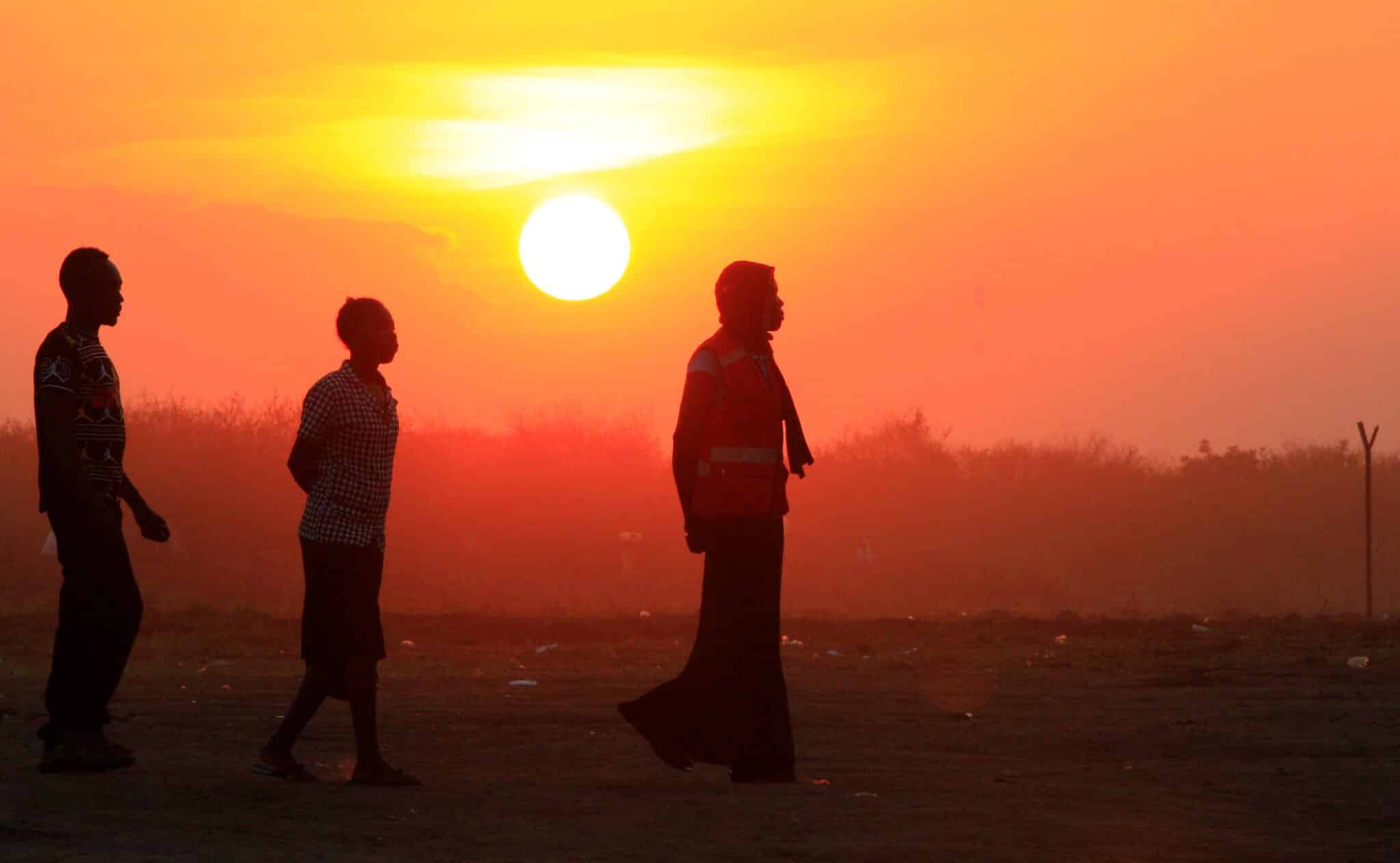 People who fled fighting in South Sudan are seen in a file photo walking at sunset on arrival at Bidi Bidi refugee camp near the border with South Sudan, in Yumbe, Uganda. (OSV News photo/James Akena, Reuters)