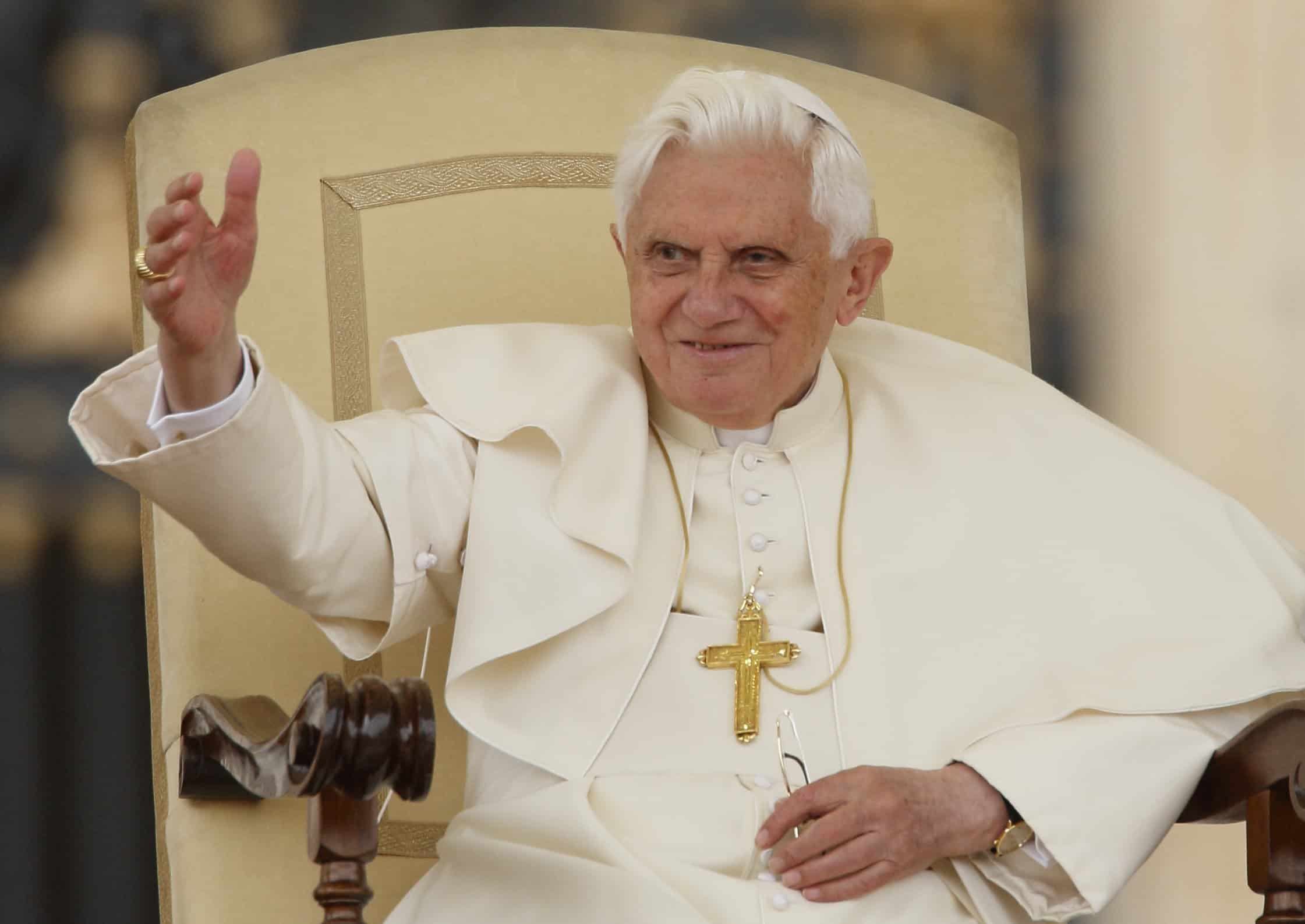 Pope Benedict XVI acknowledges pilgrims during his general audience in St. Peter's Square at the Vatican Nov. 4, 2009. Pope Benedict died Dec. 31, 2022, at the age of 95 in his residence at the Vatican. (CNS photo/Paul Haring)