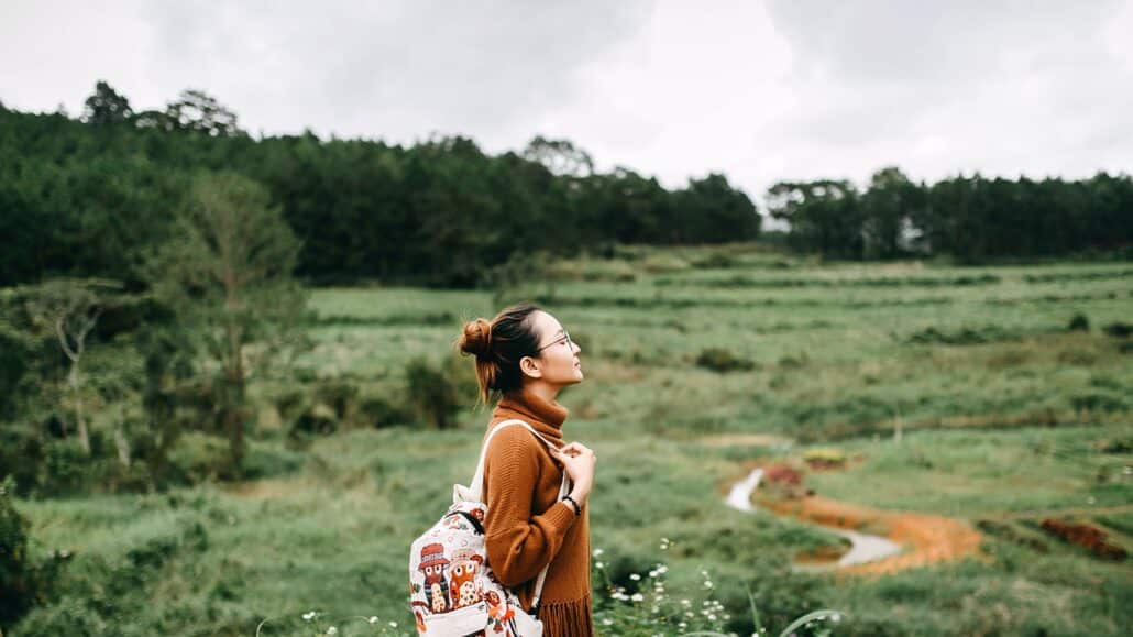 Woman pauses to breathe | Photo by Anthony Tran on Unsplash