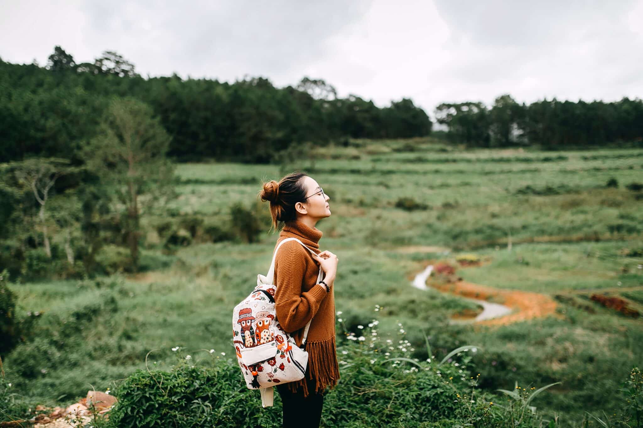 Woman pauses to breathe | Photo by Anthony Tran on Unsplash