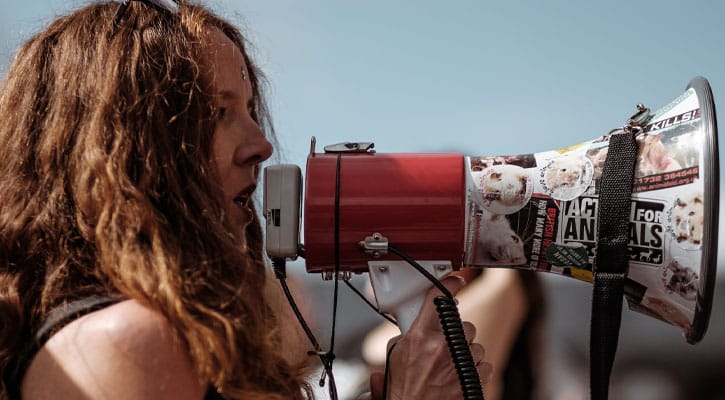Woman with bullhorn
