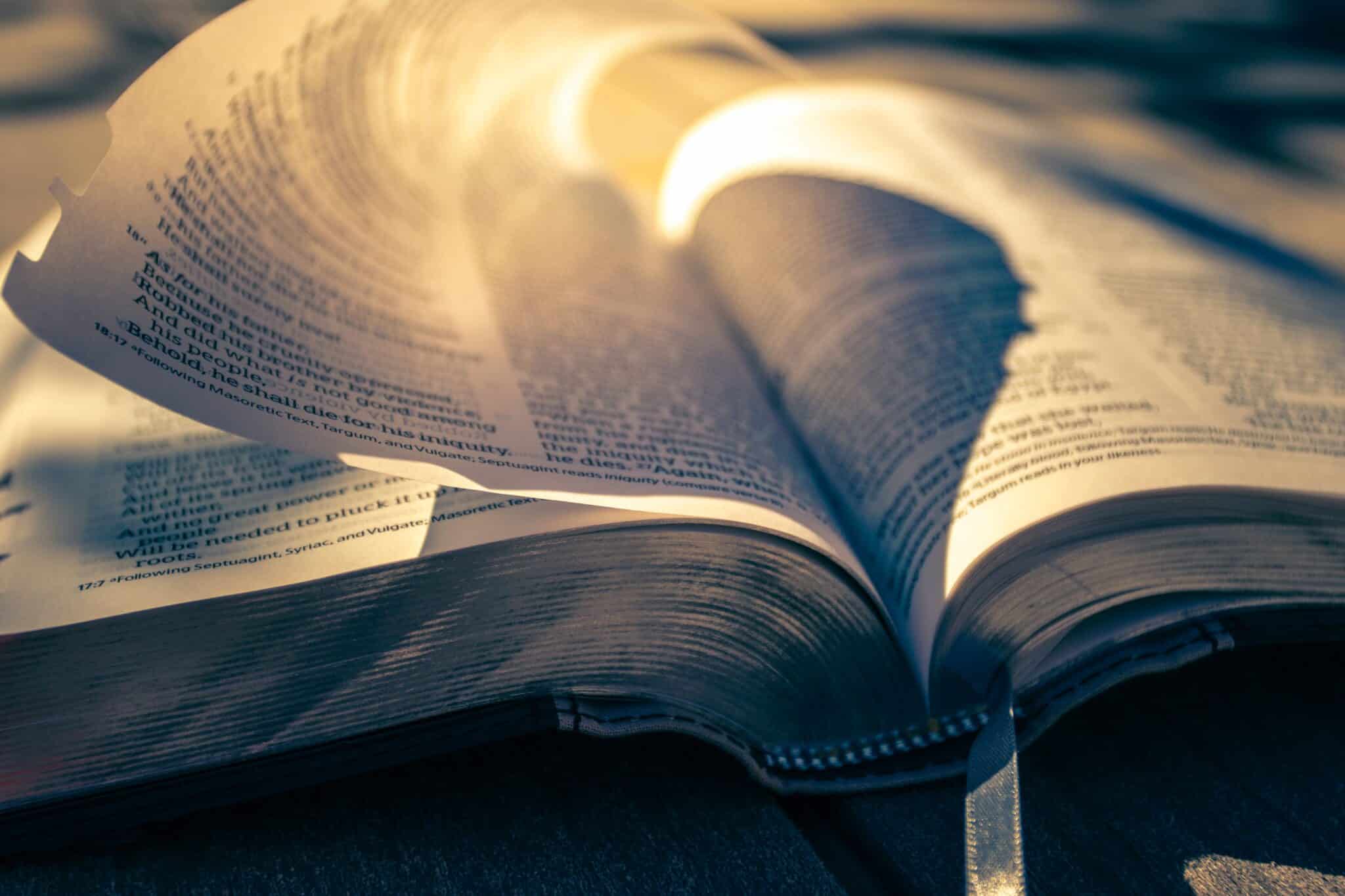 The Bible on a table | Photo by Timothy Eberly on Unsplash