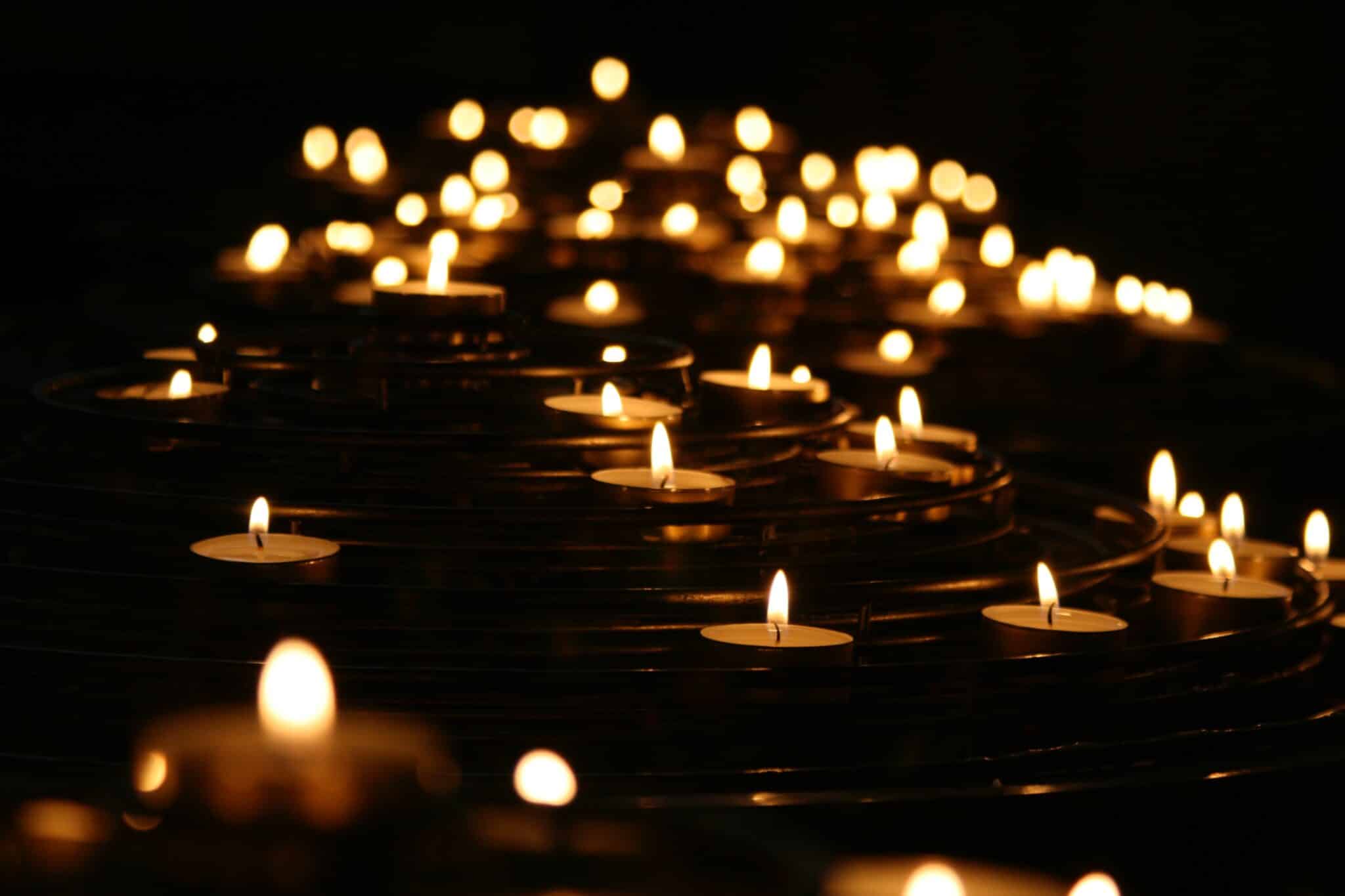 Votive candles | Photo by Mike Labrum on Unsplash