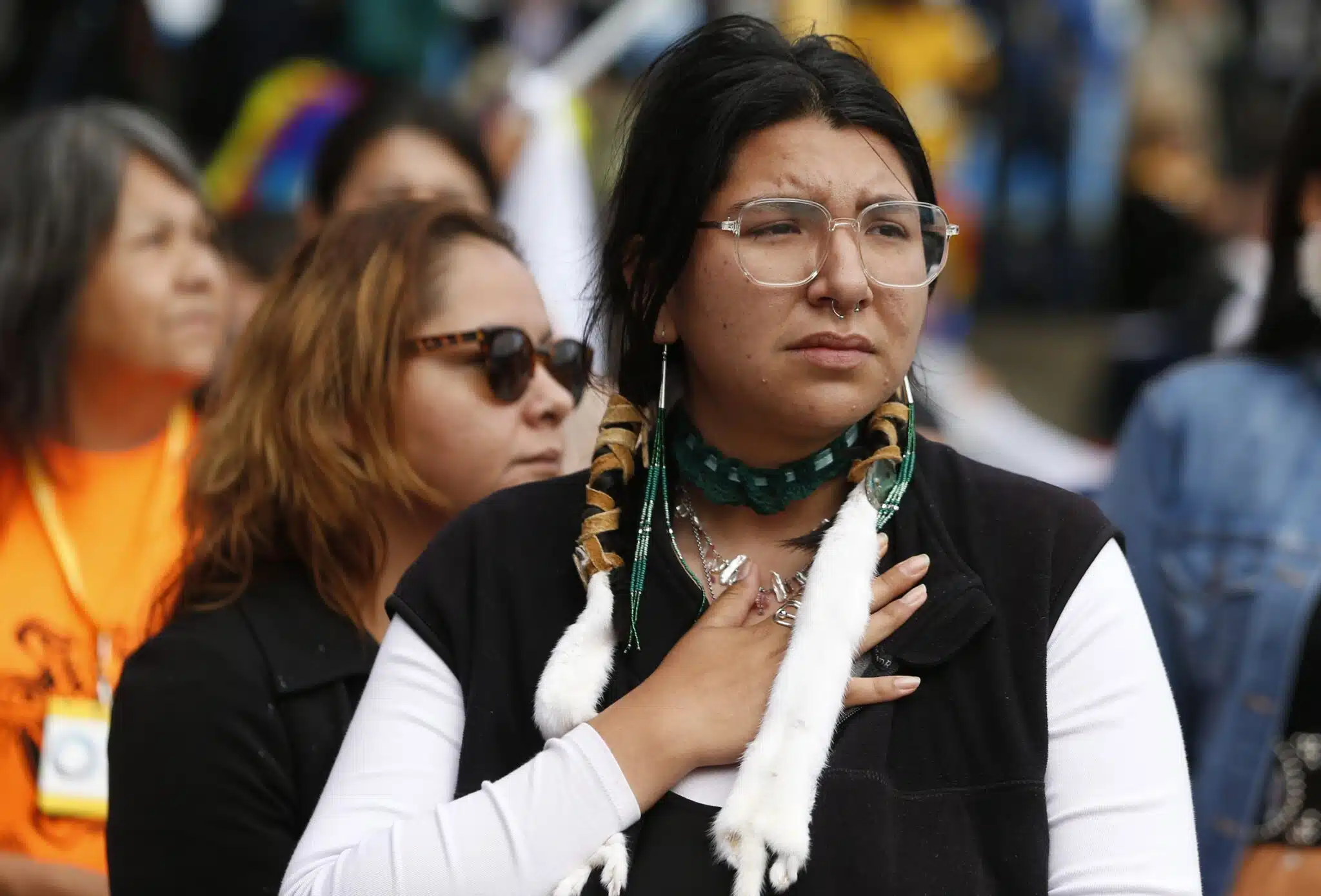 An Indigenous woman reacts as Pope Francis meets with First Nations, Métis and Inuit communities at Maskwacis, Alberta, July 25, 2022. Women leaders from among Canada's Indigenous nations were at the United Nations' New York headquarters March 8, 2023, seeking broad support, including from Pope Francis, in their ongoing campaign to stop violence against their communities' women and girls. (CNS photo/Paul Haring)