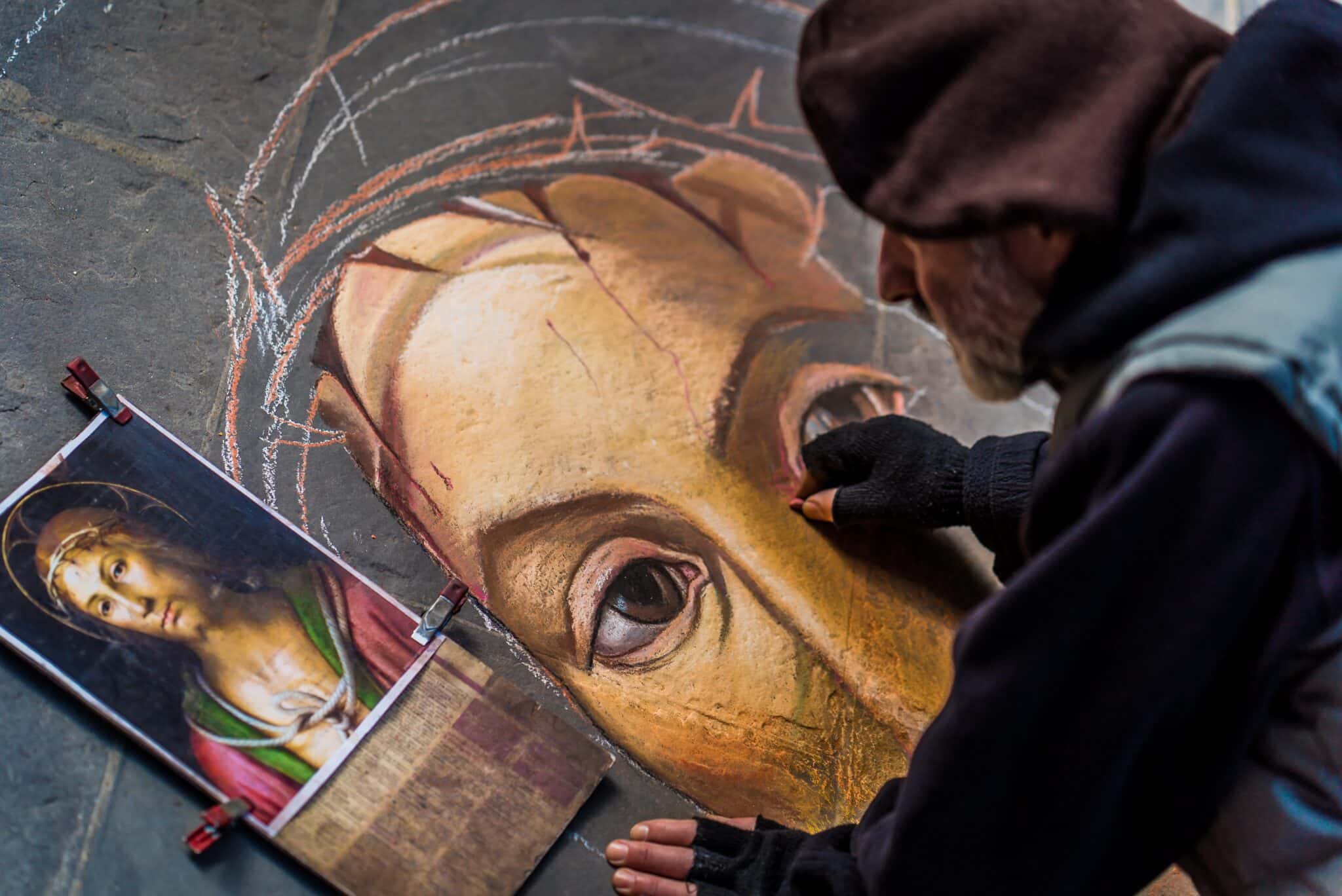 Man sketching jesus | Photo by Karsten Winegeart on Unsplash