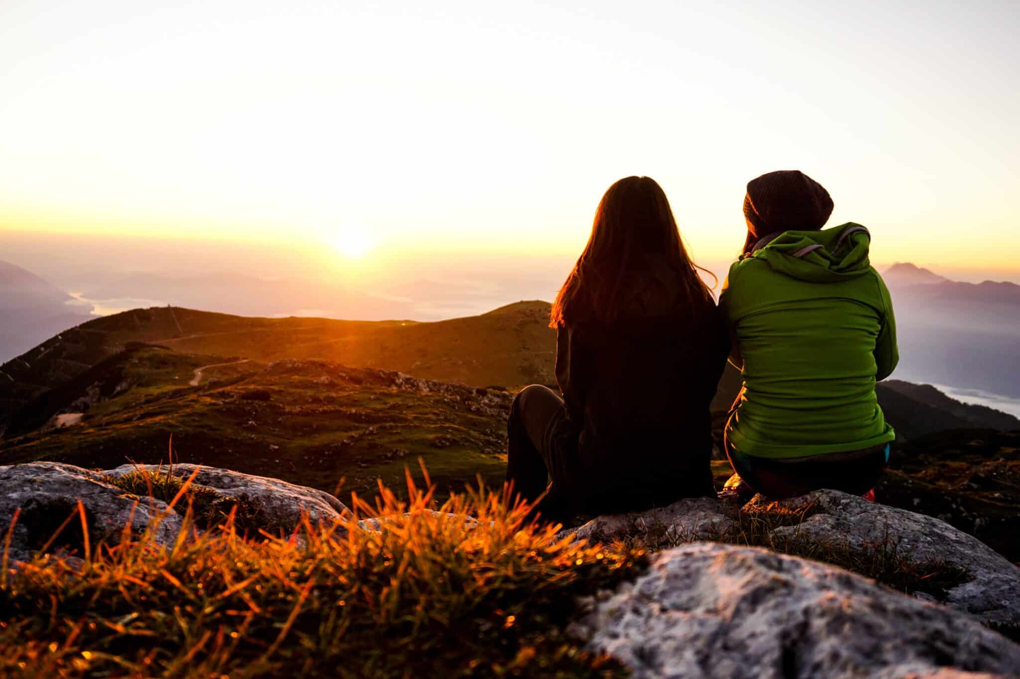 two friends on a mountain | Photo by Cornelia Steinwender on Unsplash