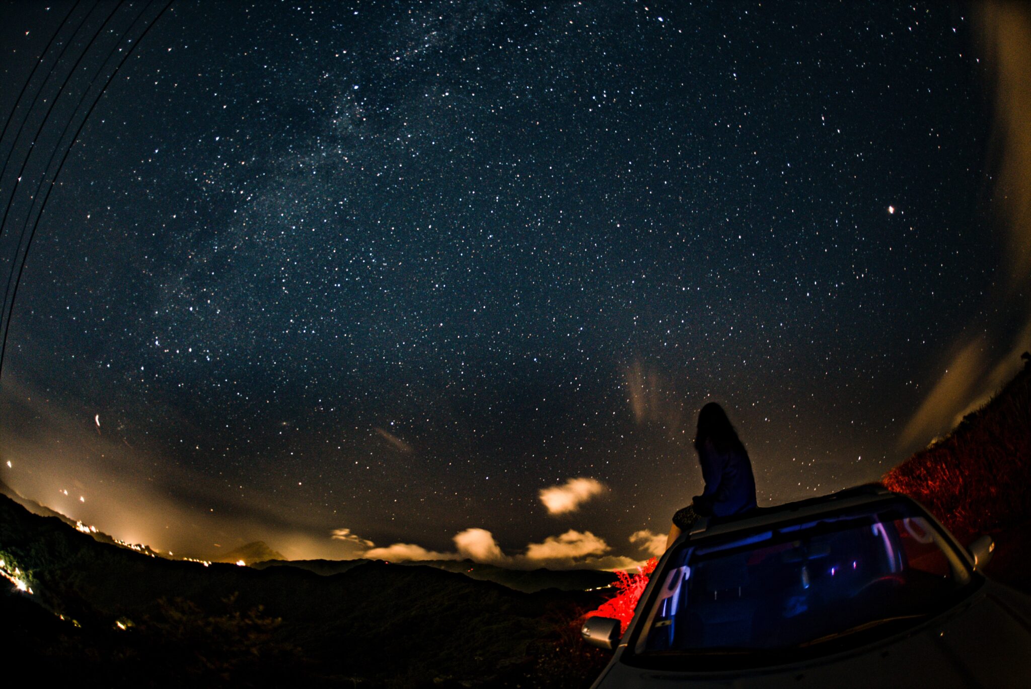 woman looking at the stars | Photo by Steven Su on Unsplash